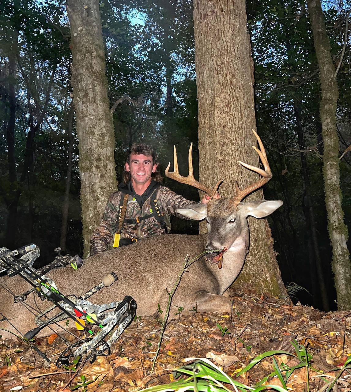 Hunting Success Buck and Bow